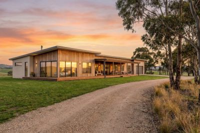 Modern custom-designed home on a Gold Coast acreage block at golden hour