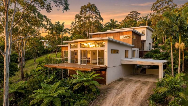 Split level home designs built into a sloping Gold Coast hinterland block with timber deck and stepped levels